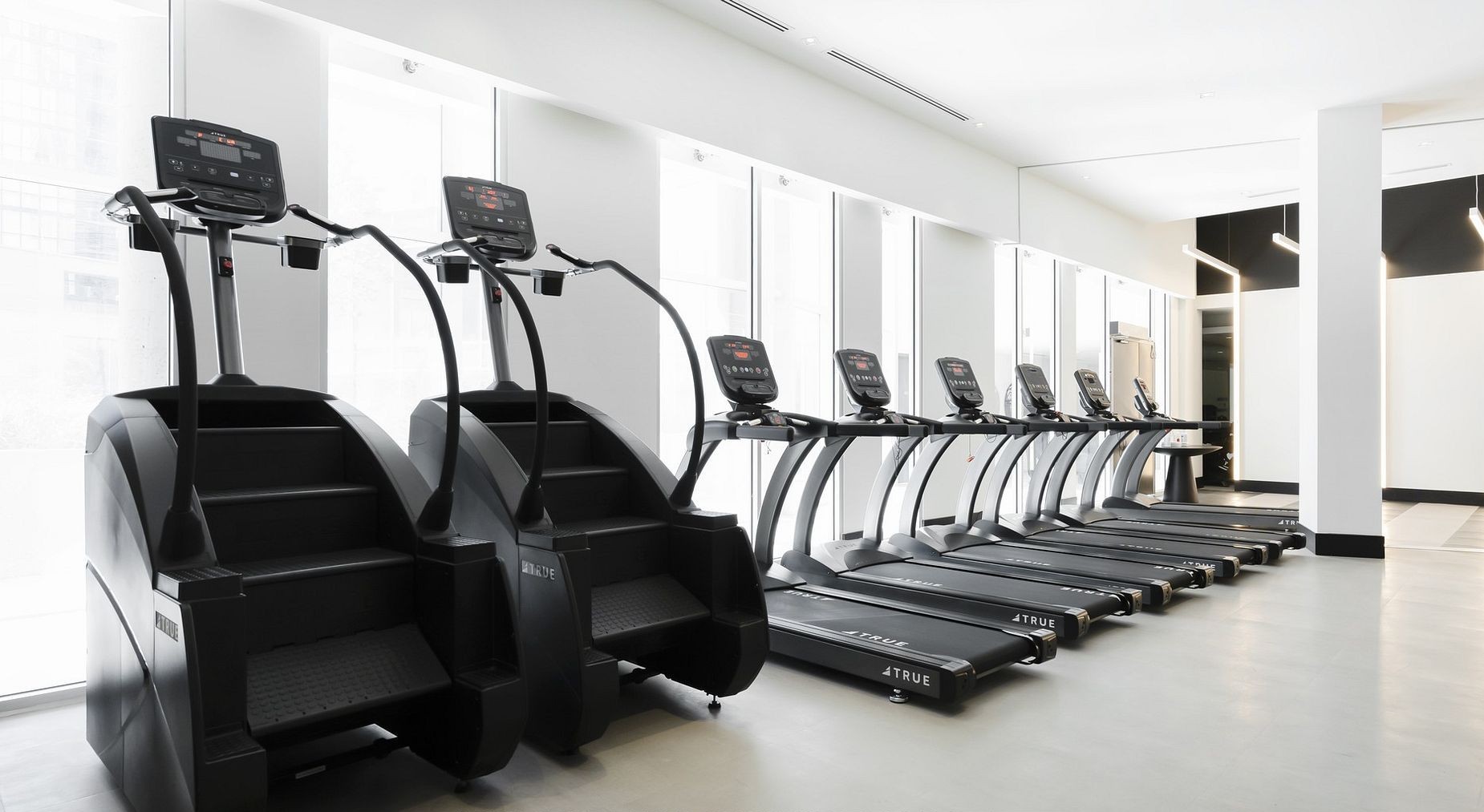Fitness center with cardio machines amenity