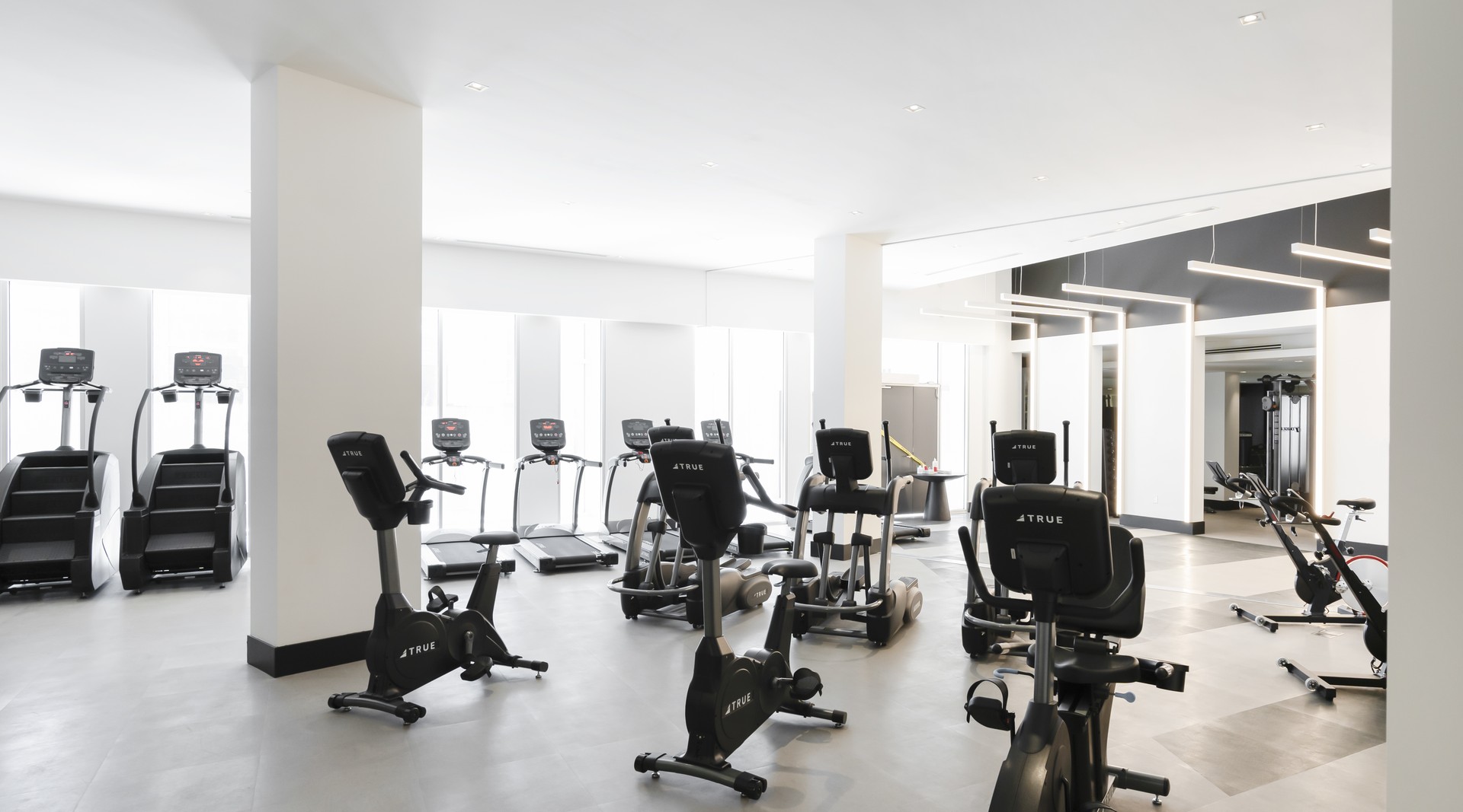 Full gym with bikes and equipment amenity